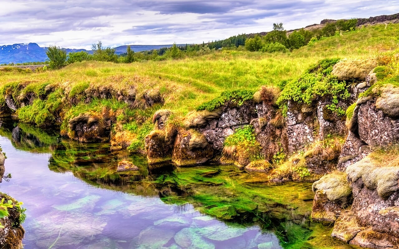 Water in a fissure between tectonic plates in the Thingvellir National Park, Iceland