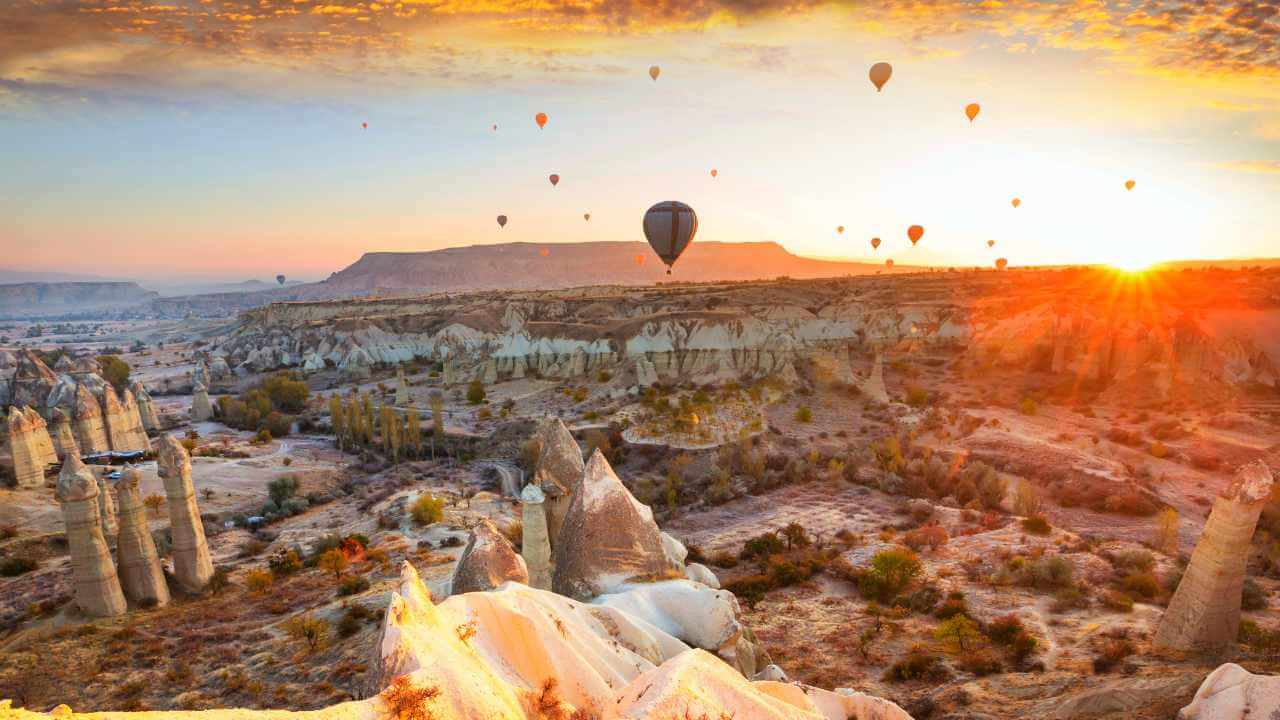 balloons flying over cappadocia, turkey