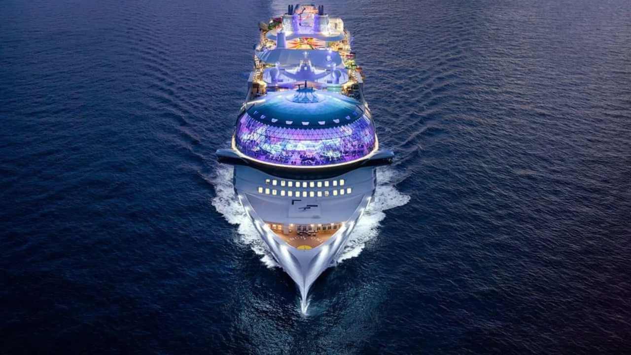 an aerial view of a cruise ship in the ocean