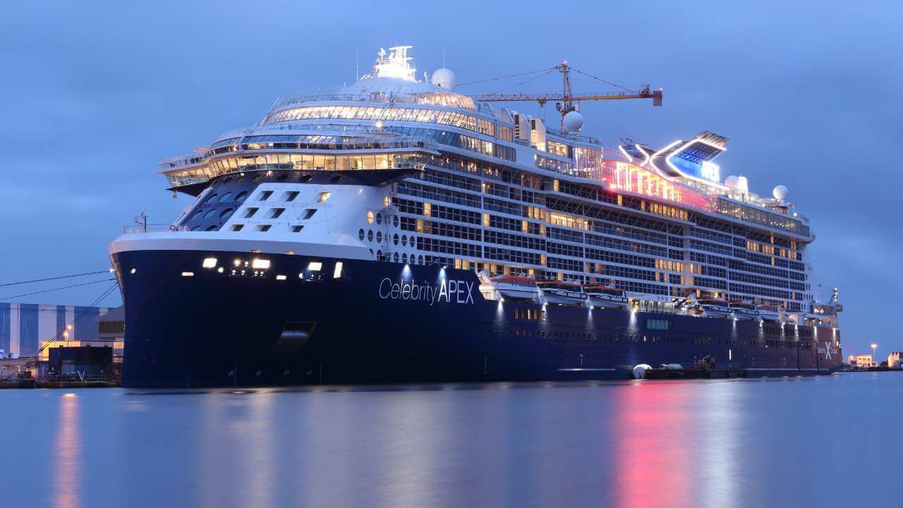 a large cruise ship is docked in the water