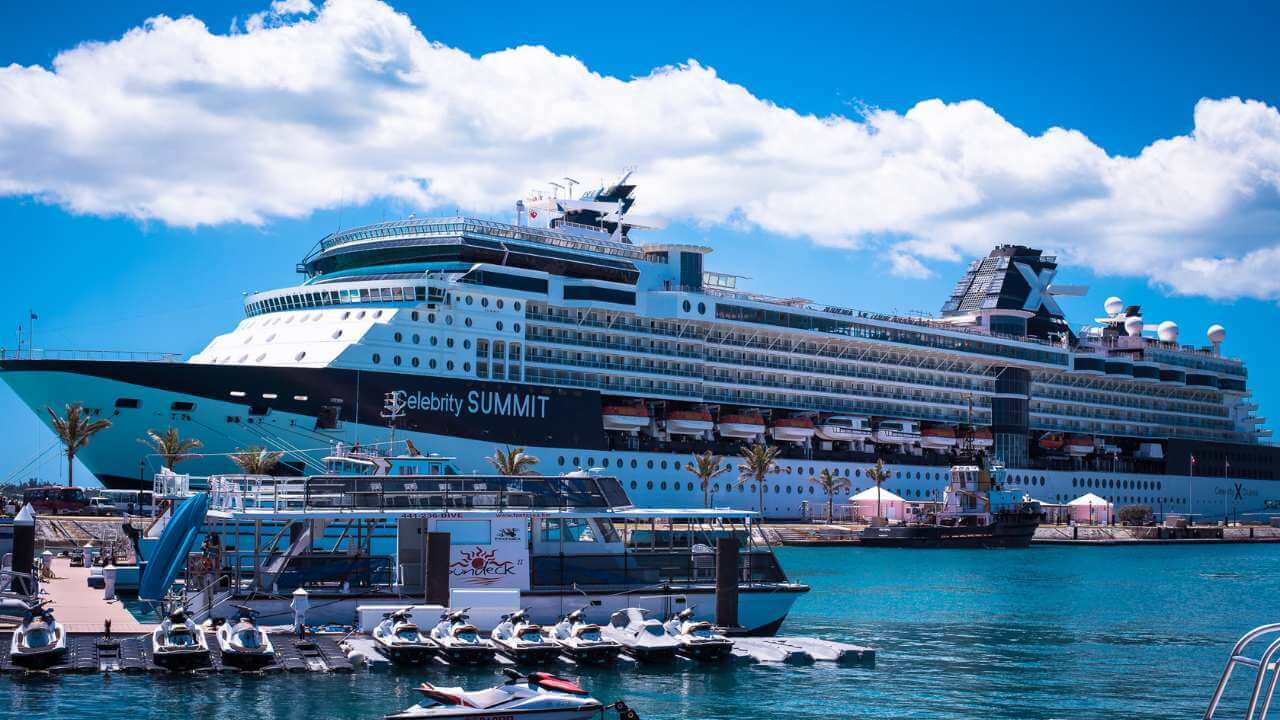 a large cruise ship docked at the dock