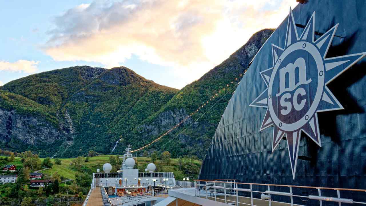 the cruise ship has a large sign on it