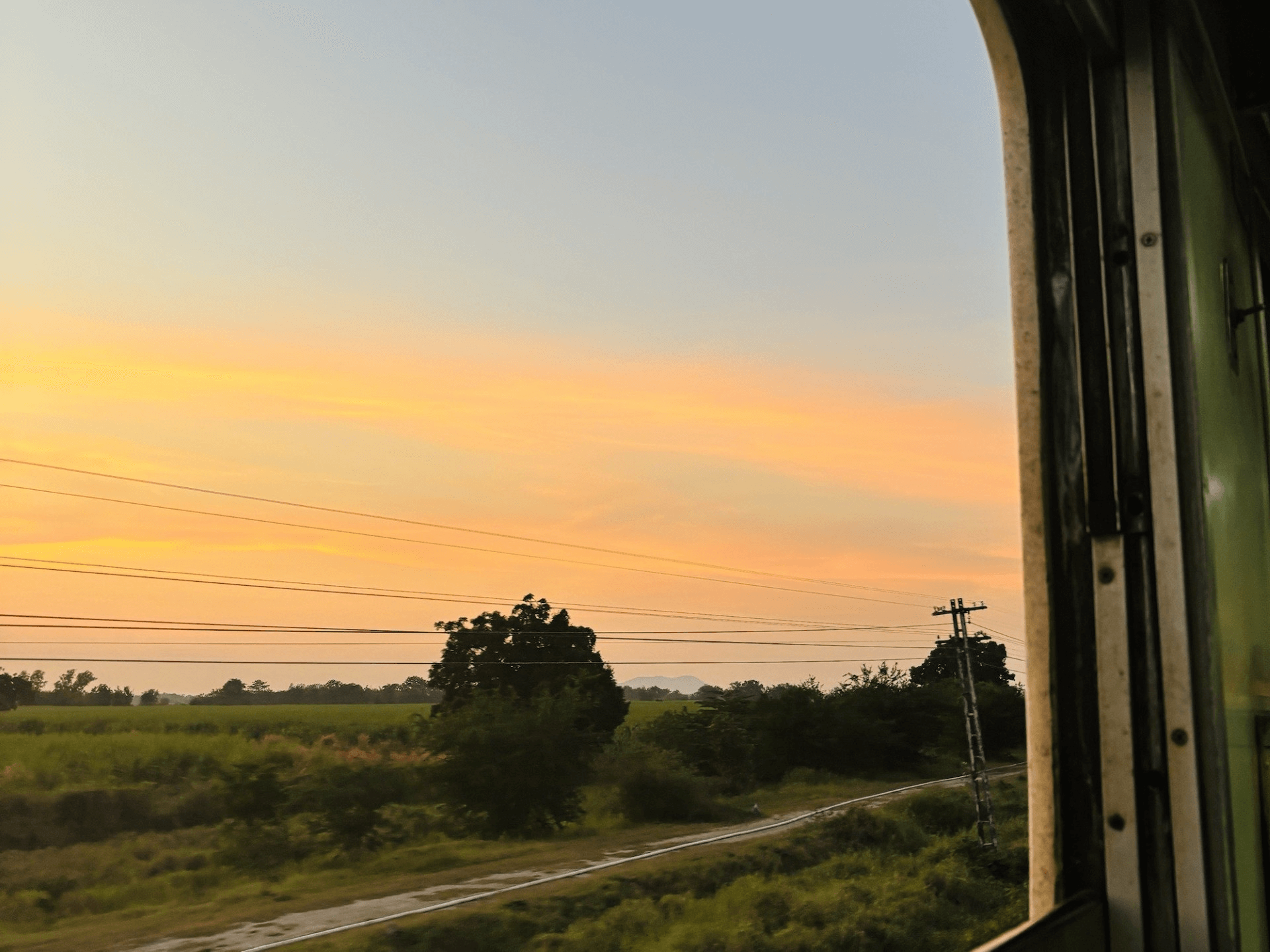 sunset view from inside of a train