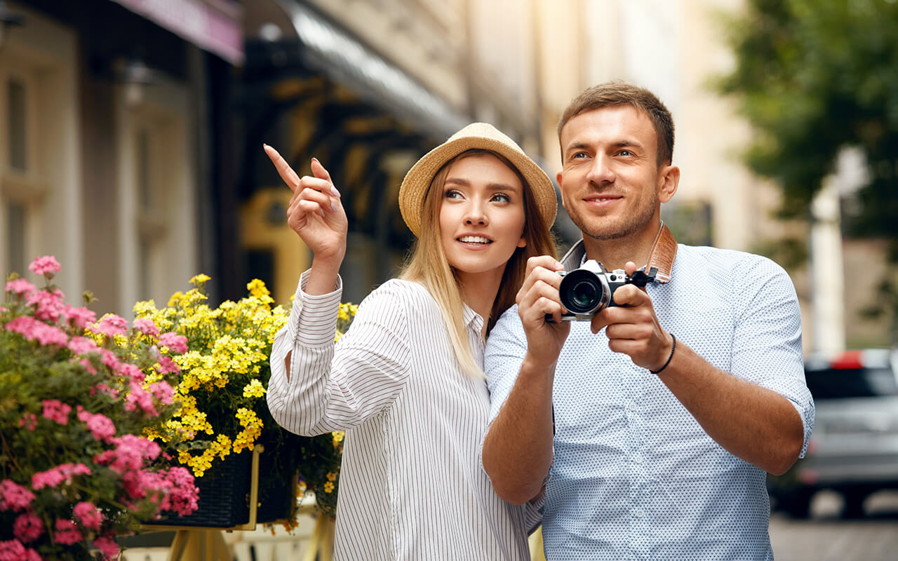 Tourists with a camera