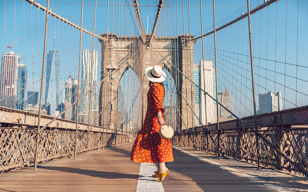 Young tourist on the Brooklyn Bridge