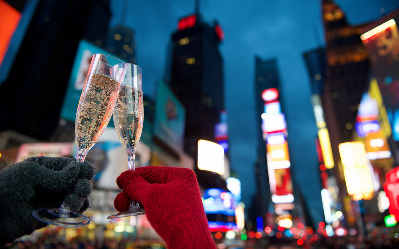 New Year’s Eve celebration with champagne in a major city destination