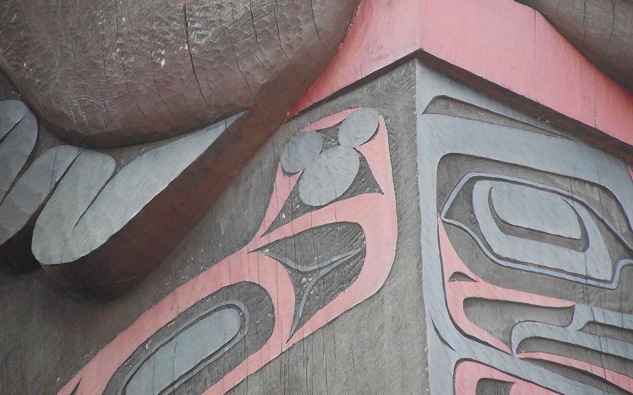 A Hidden Mickey on a totem pole at the Canada pavilion, Epcot