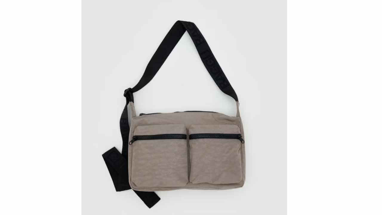 the cross body bag in beige and black