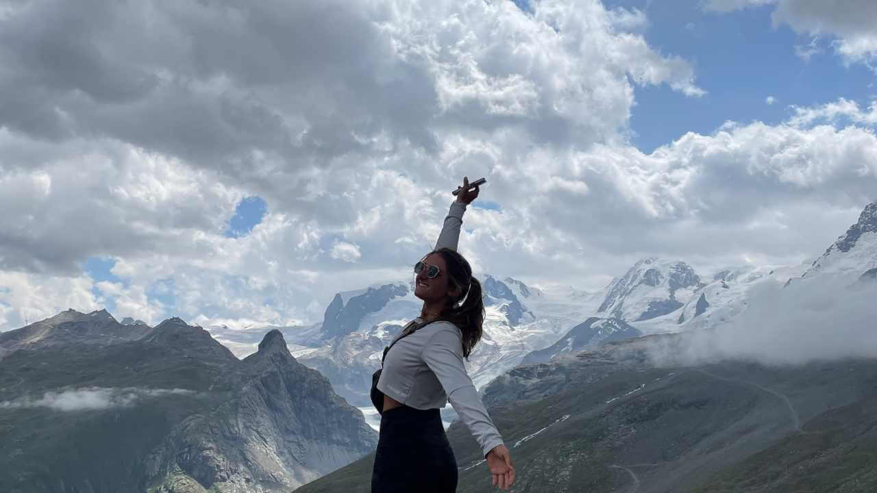 girl on top of mountain