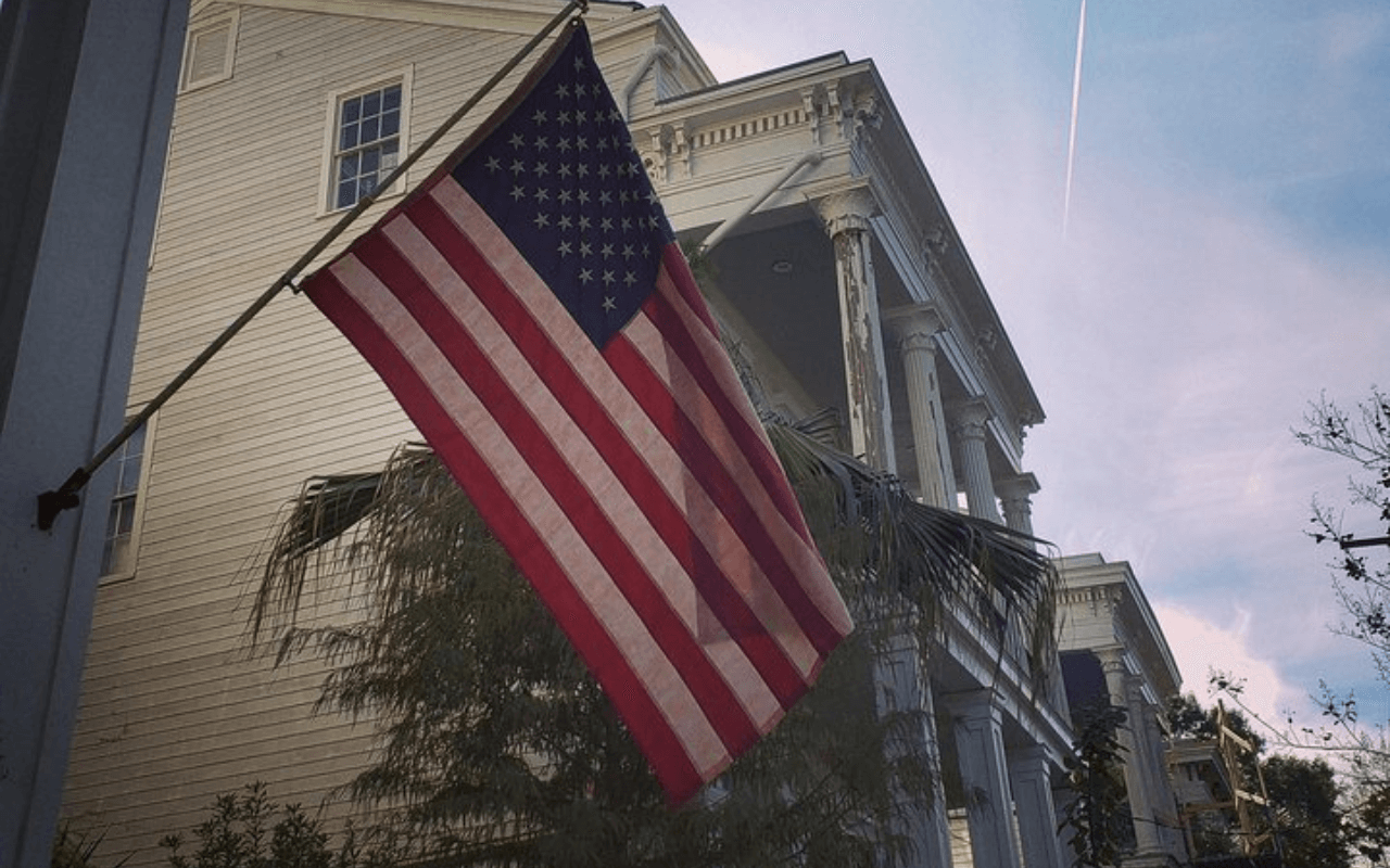 american flag waving in the sky