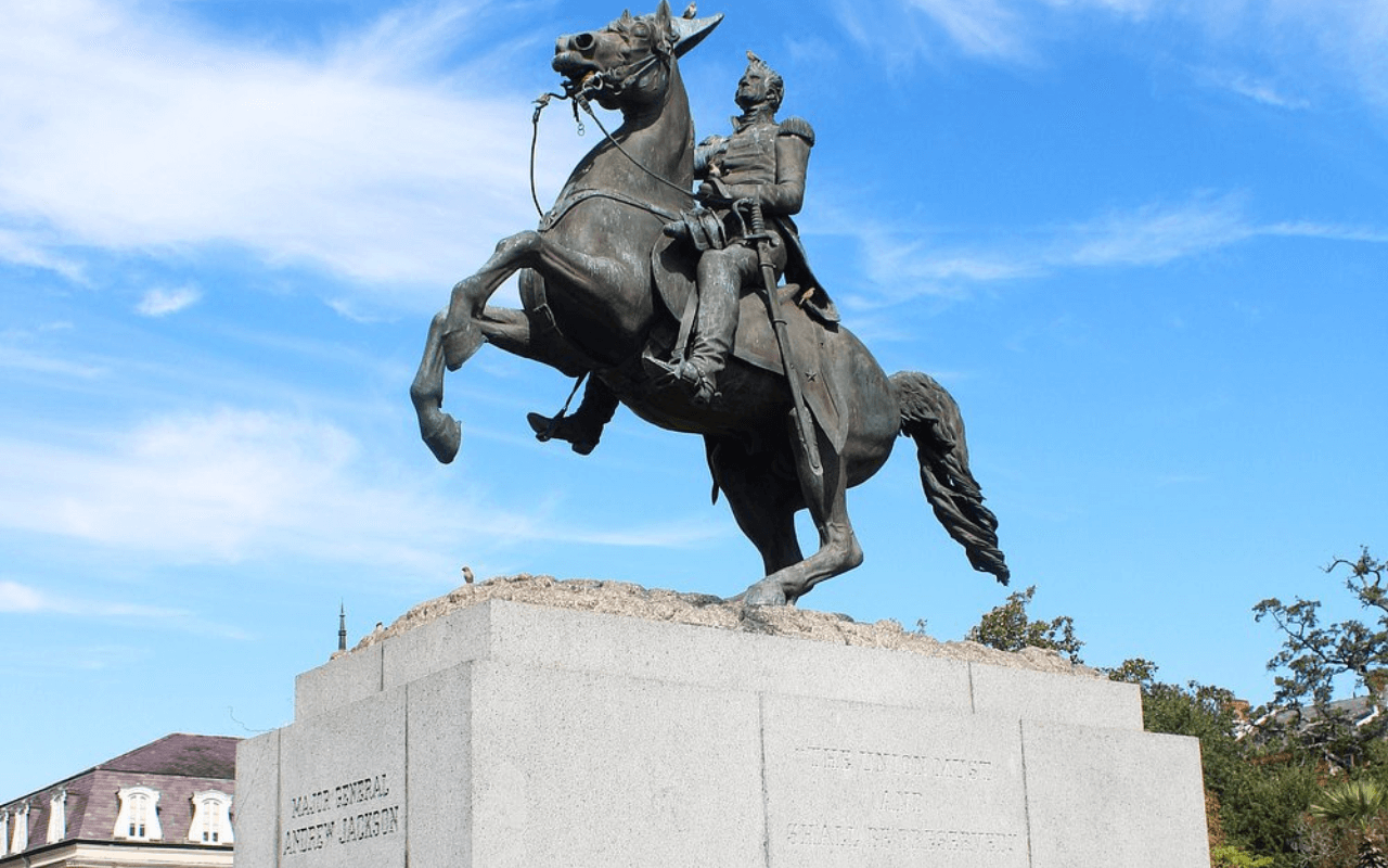 statue of a man riding a horse 