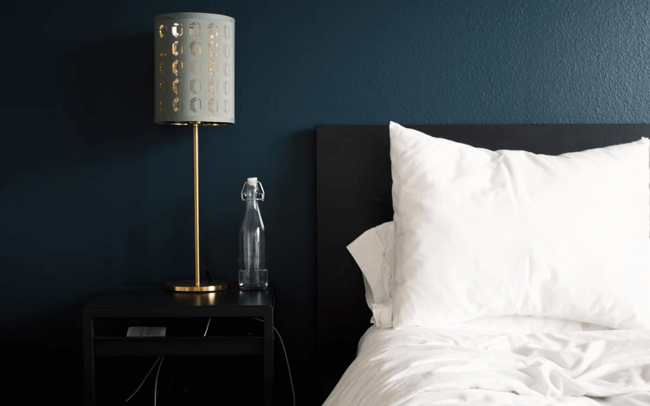 view of light and pillow in a hotel room