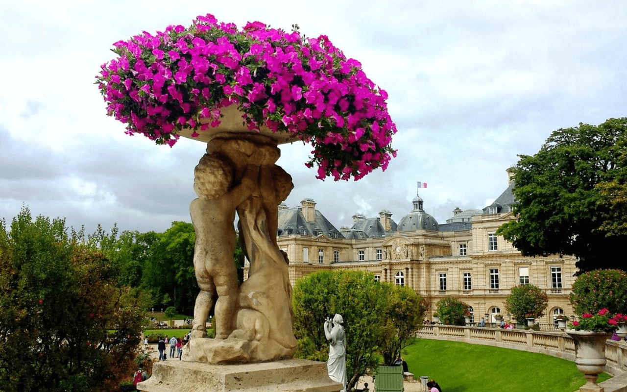 floral statue outside a building