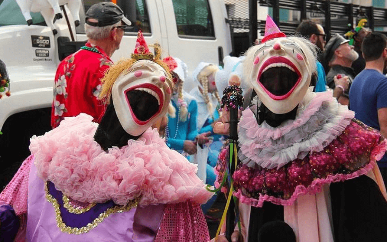 people dressed up in costumes in a parade