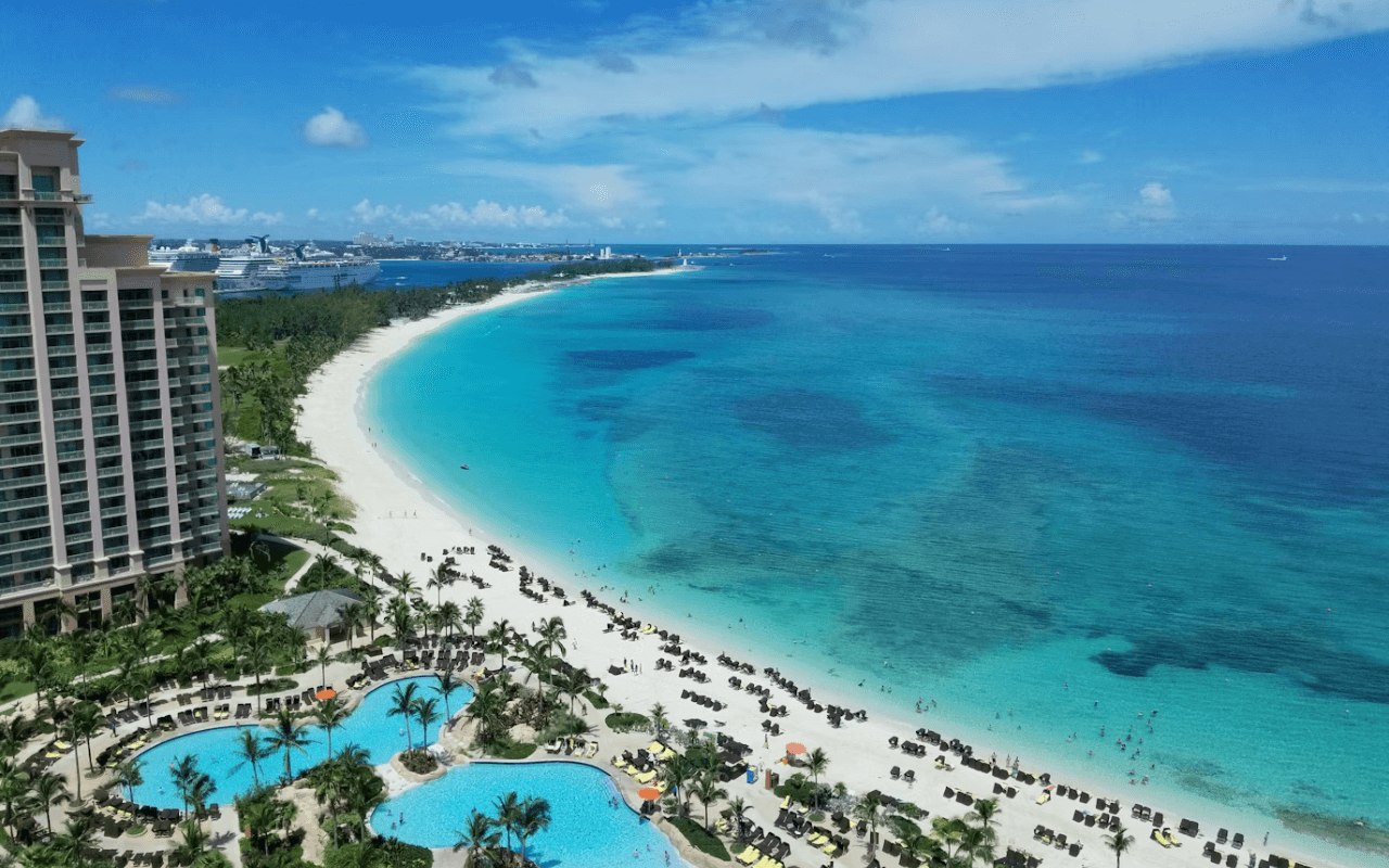 view of cystal blue water from a hotel balcony