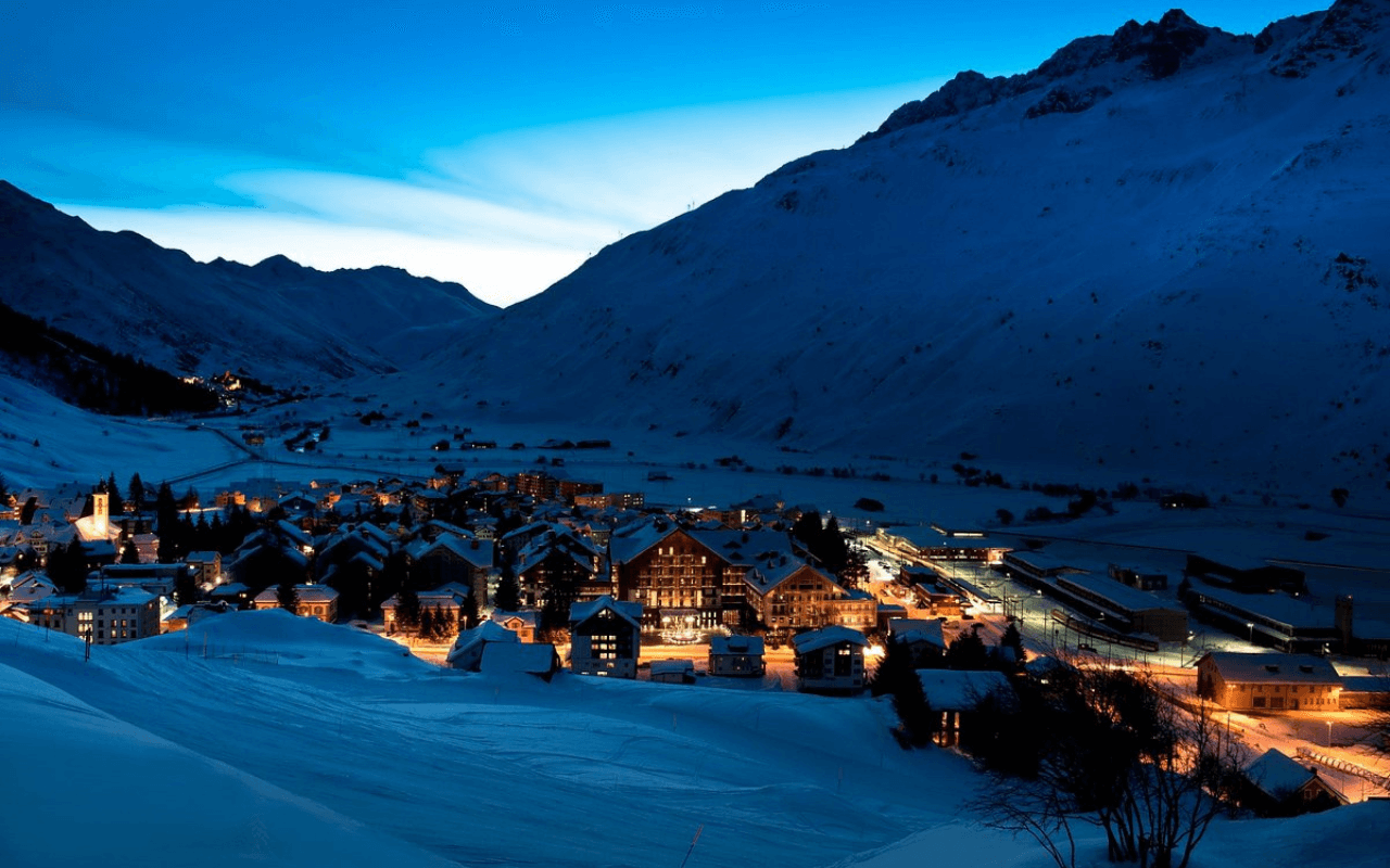village and mountians during the night time