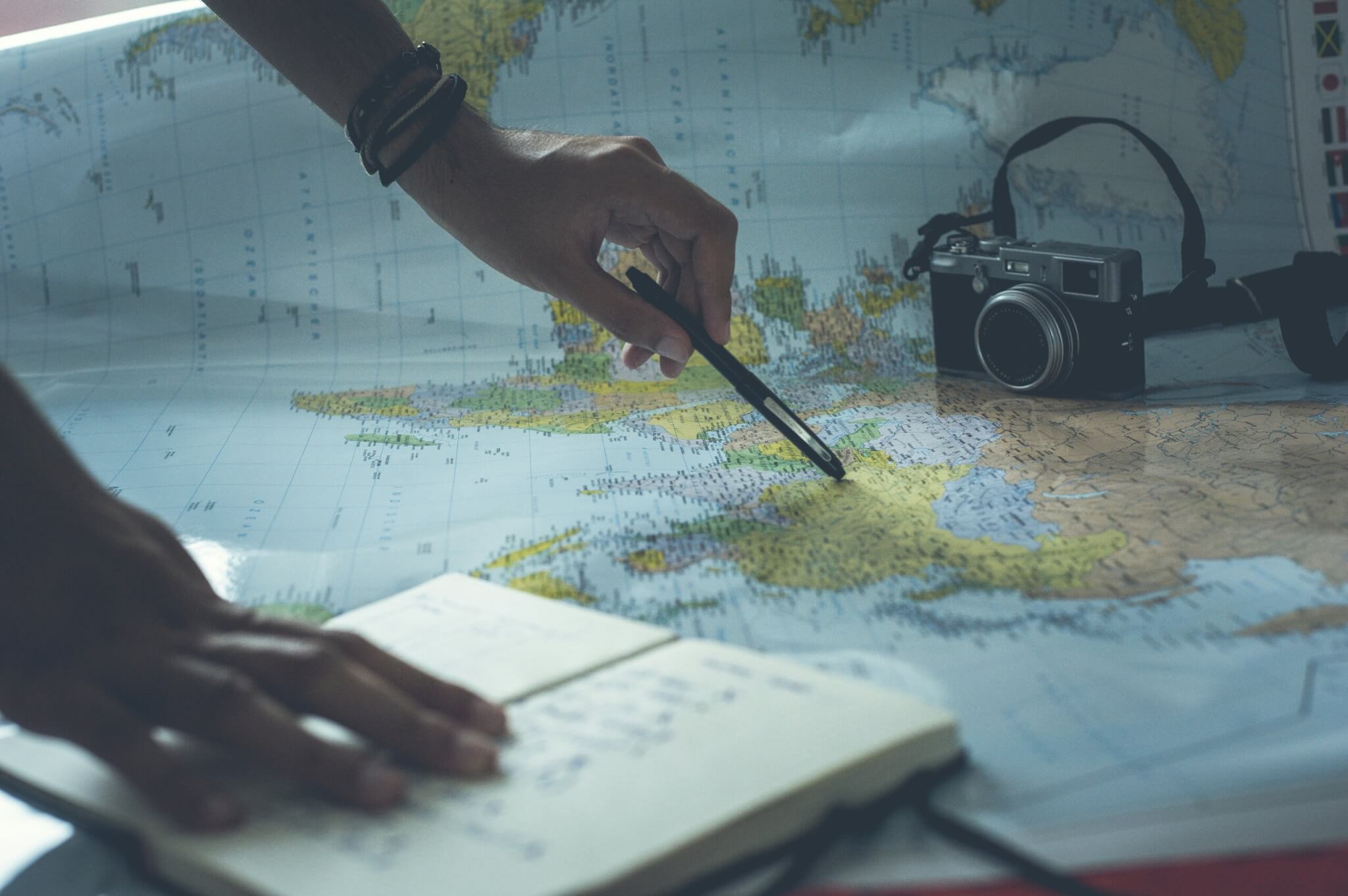 notebook and map
