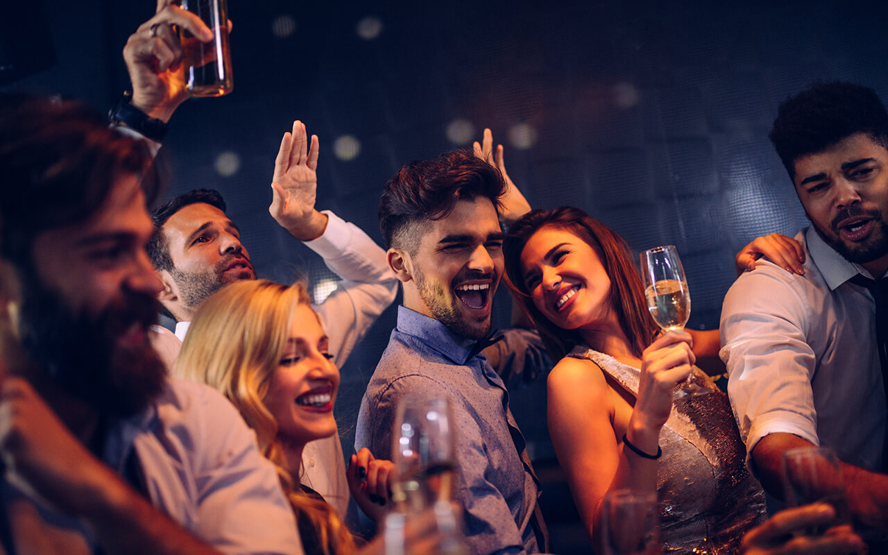 Group of people dancing at a club