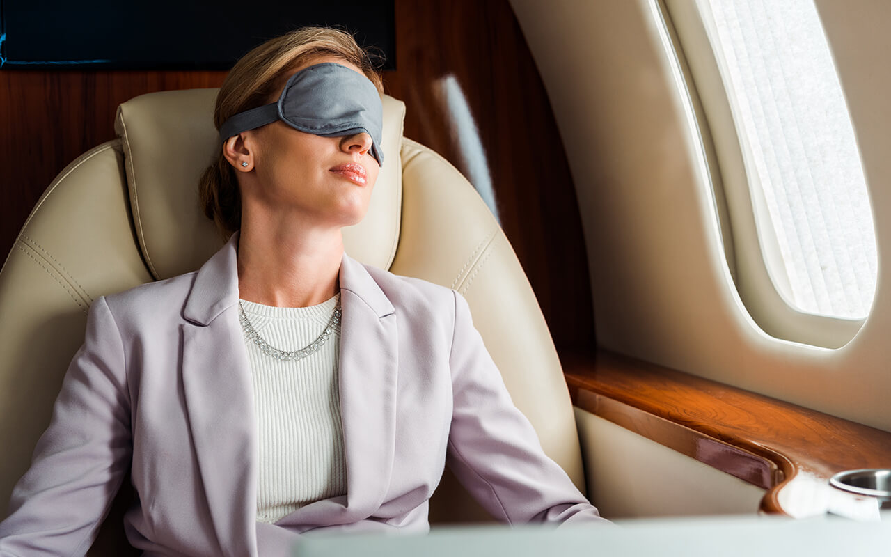 Woman sleeping on an airplane