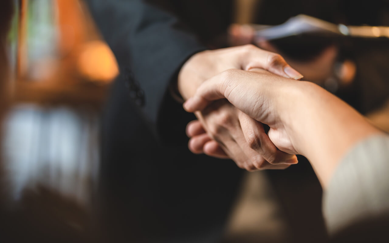 Two people shaking hands
