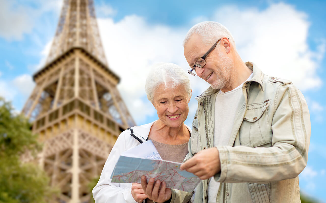 Elderly couple traveling