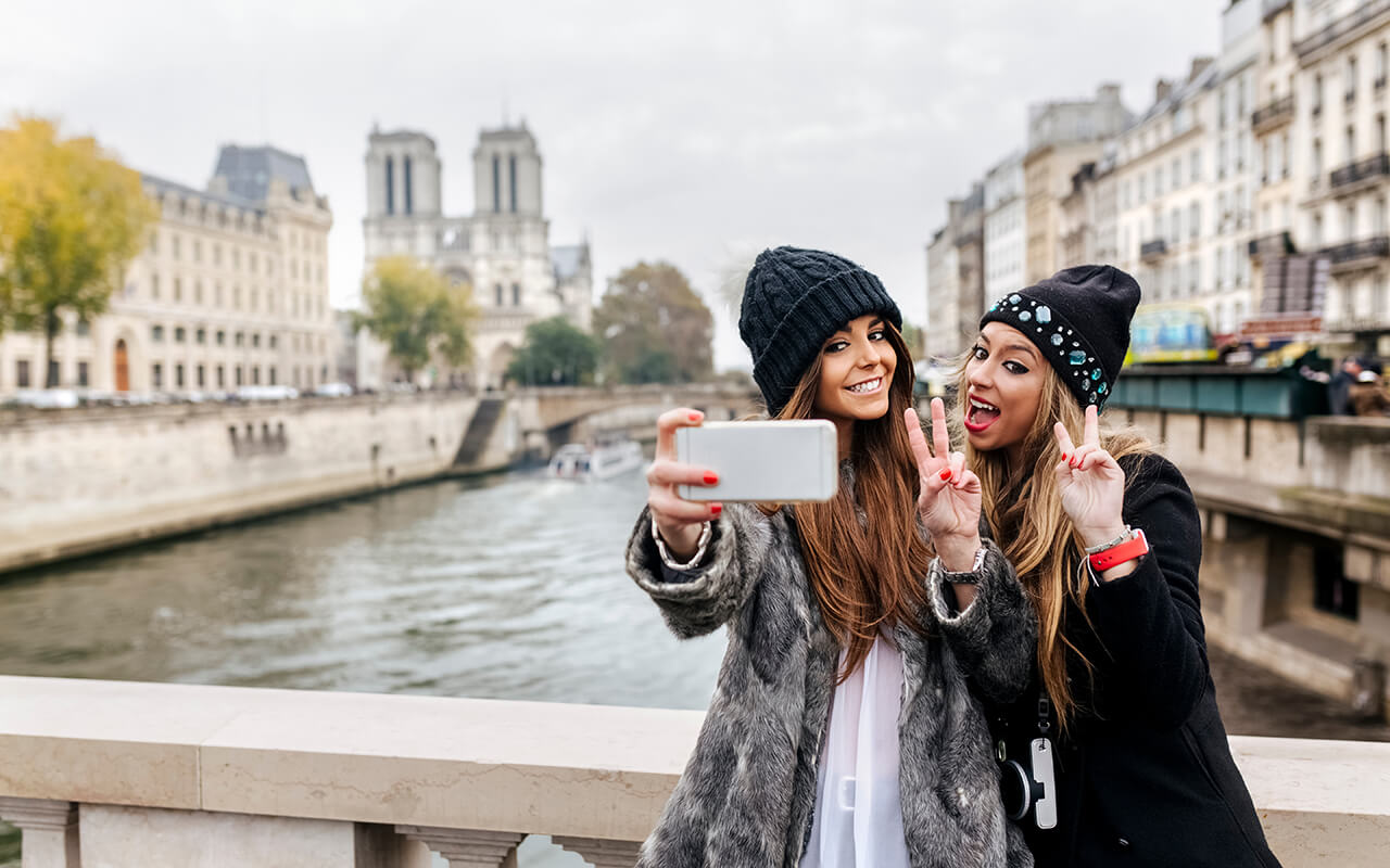 American tourists taking a selfie in Europe