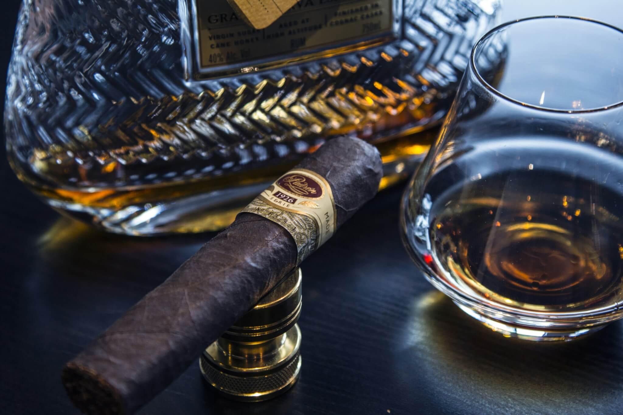 Cigar and alcoholic beverage