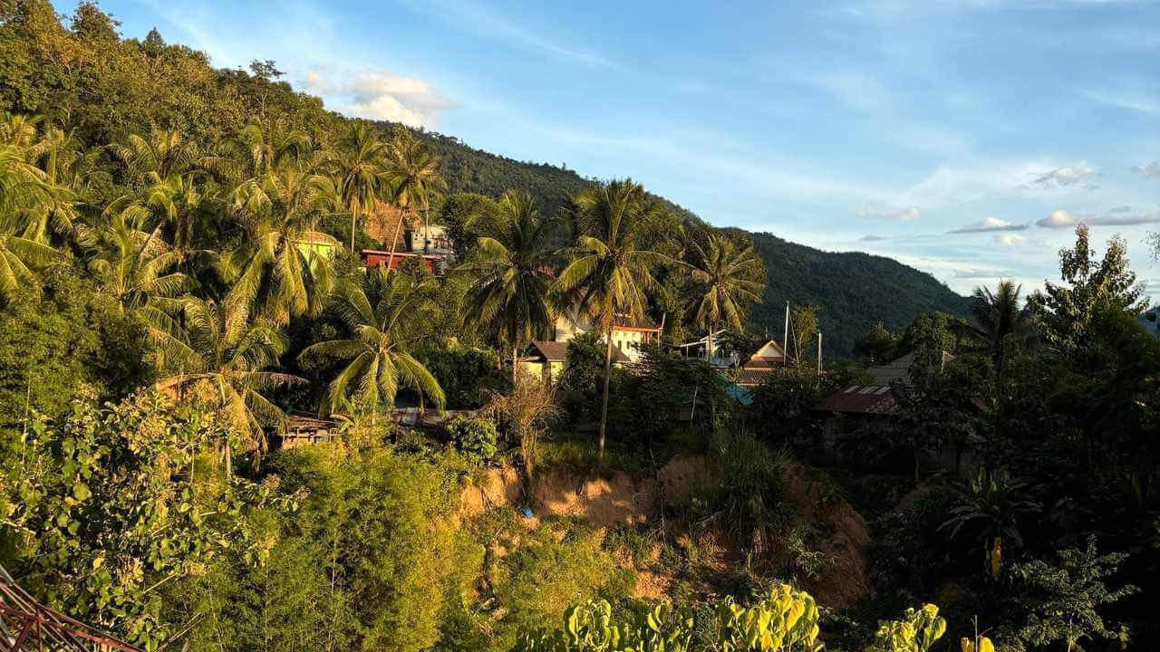 the view from the top of a hill in thailand