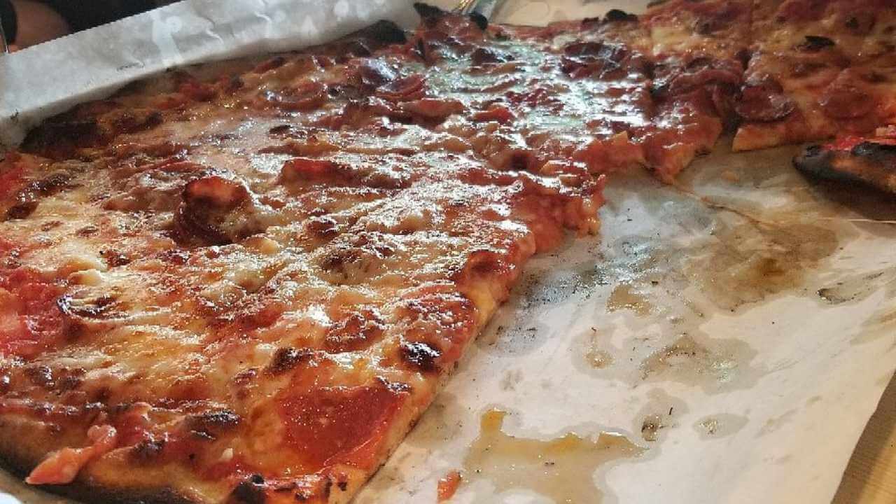 a pizza that has been cut in half
