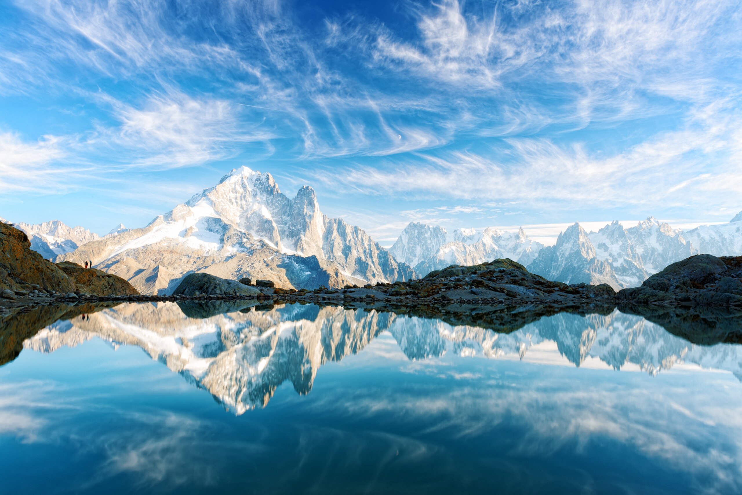 Incredible view of clear water and sky reflection on Lac Blanc lake in France Alps. Monte Bianco mountains range on background. Landscape photography, Chamonix
