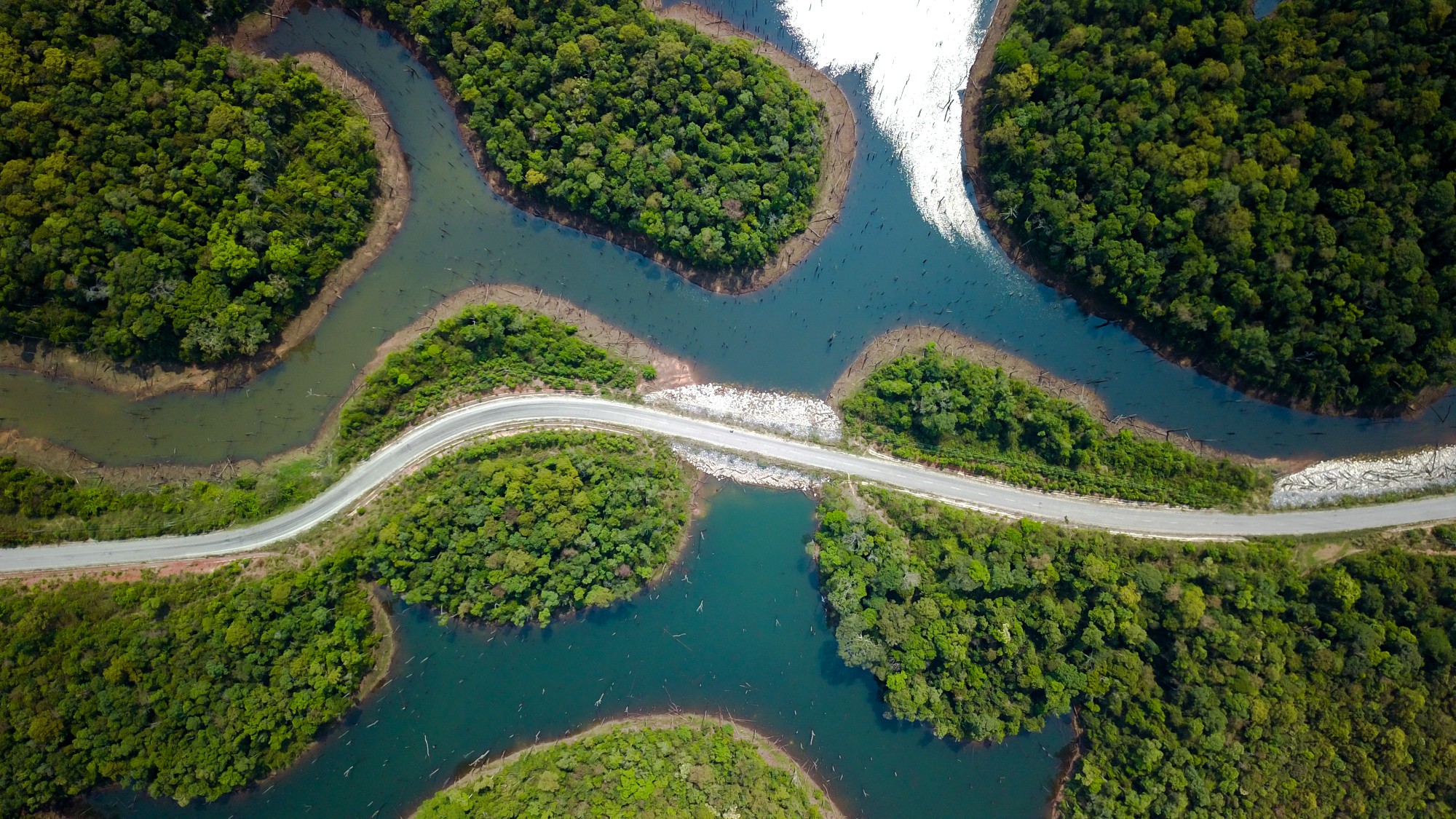 Aerial view of road and rivers along the Thakhek Loop in Laos