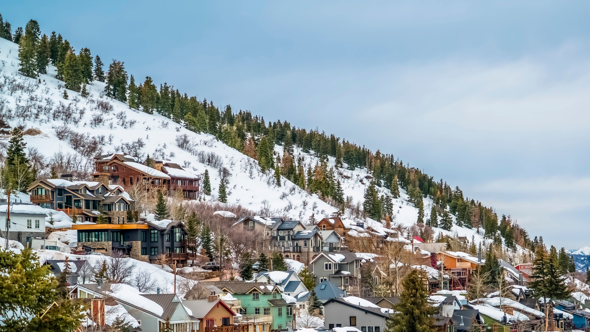 Panorama Colorful cabins on a mountain with snow during winter season in Park City Utah