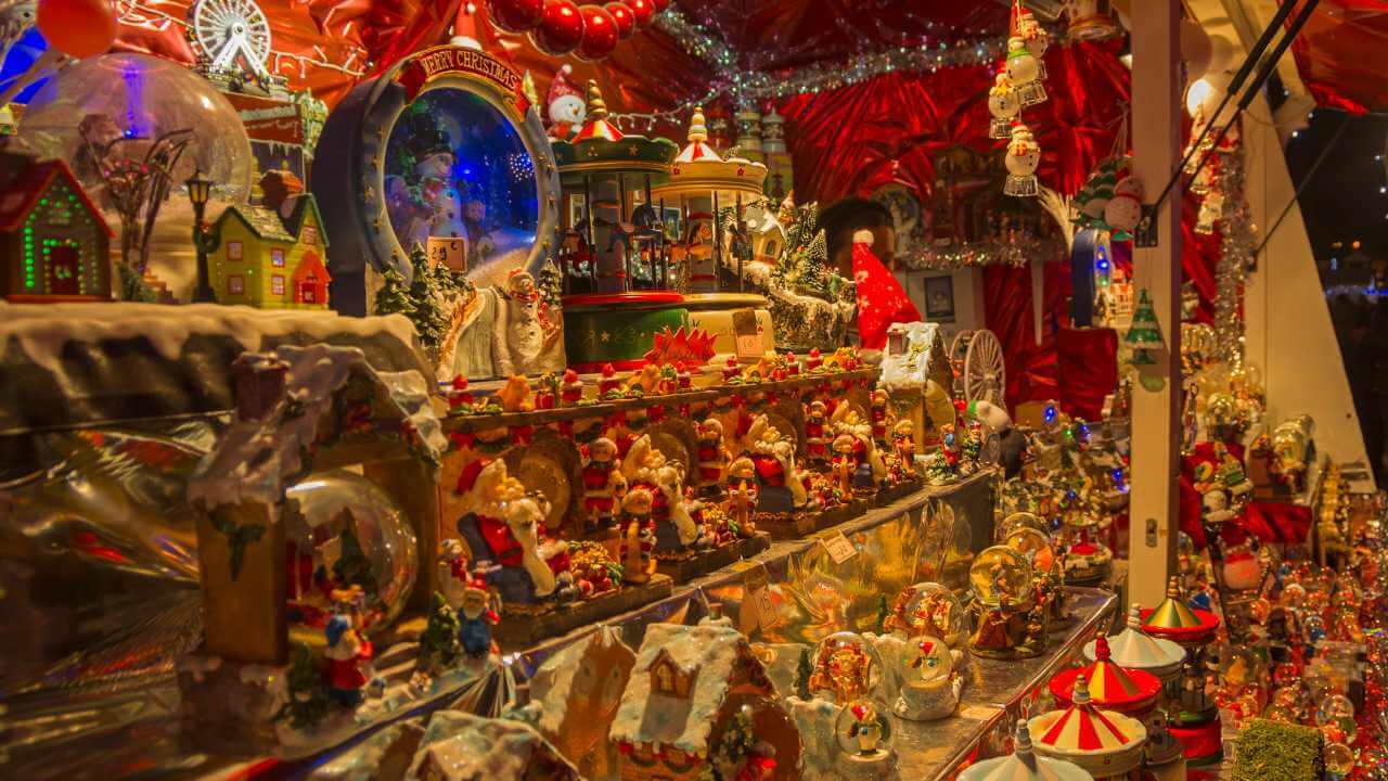 a christmas market with lots of christmas decorations