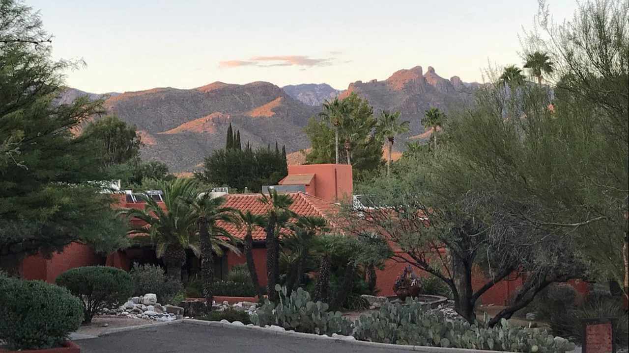 a desert landscape with mountains in the background