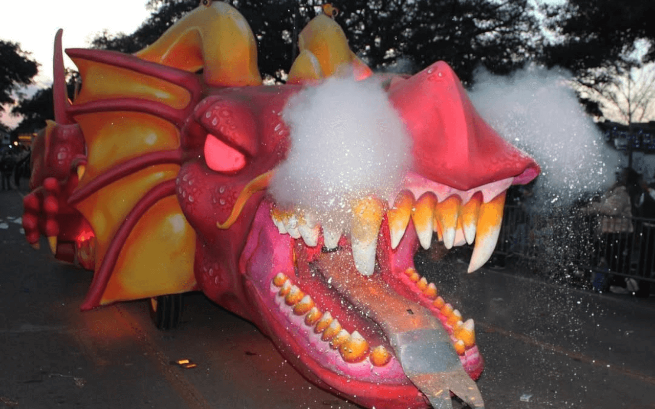 dragon parade float with mouth open