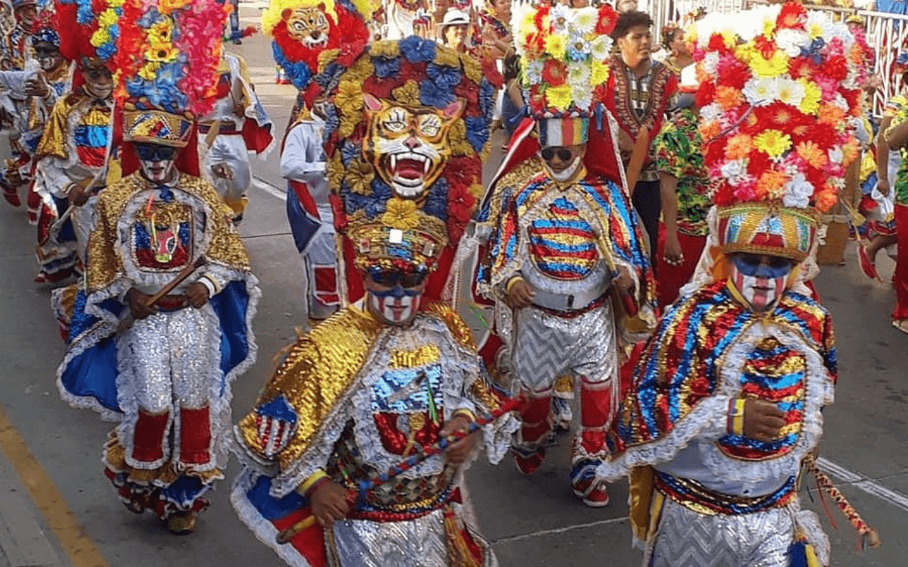 blue red and gold costumes on people in a parade