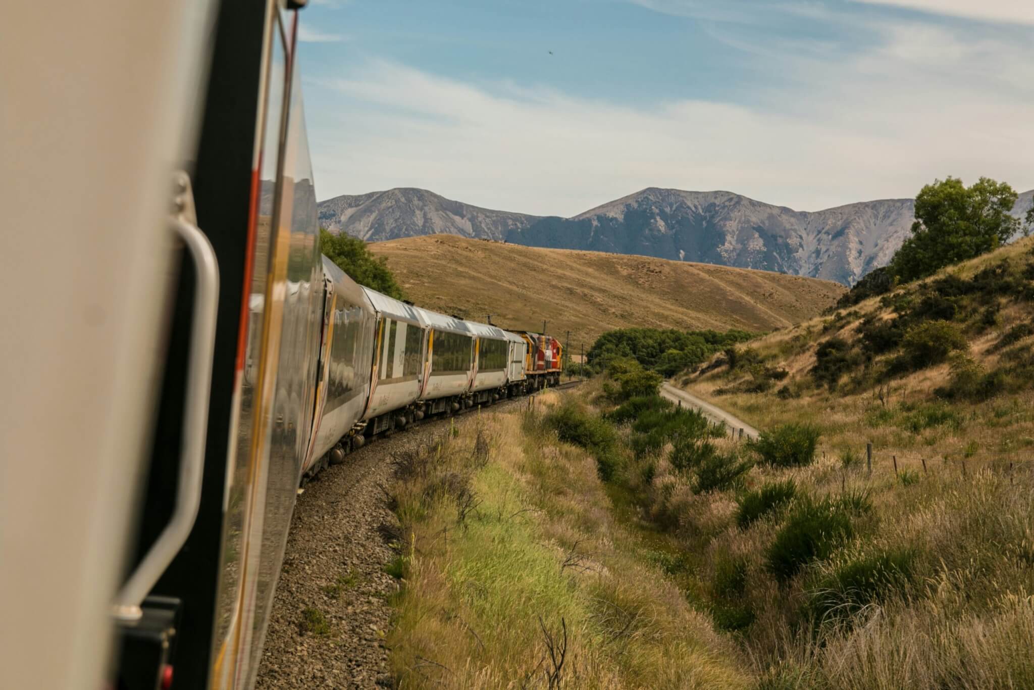 a train going through the mountains