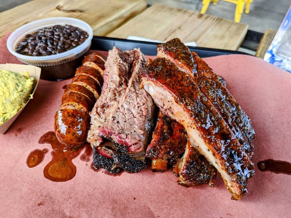 ribs and sausage and bean salad