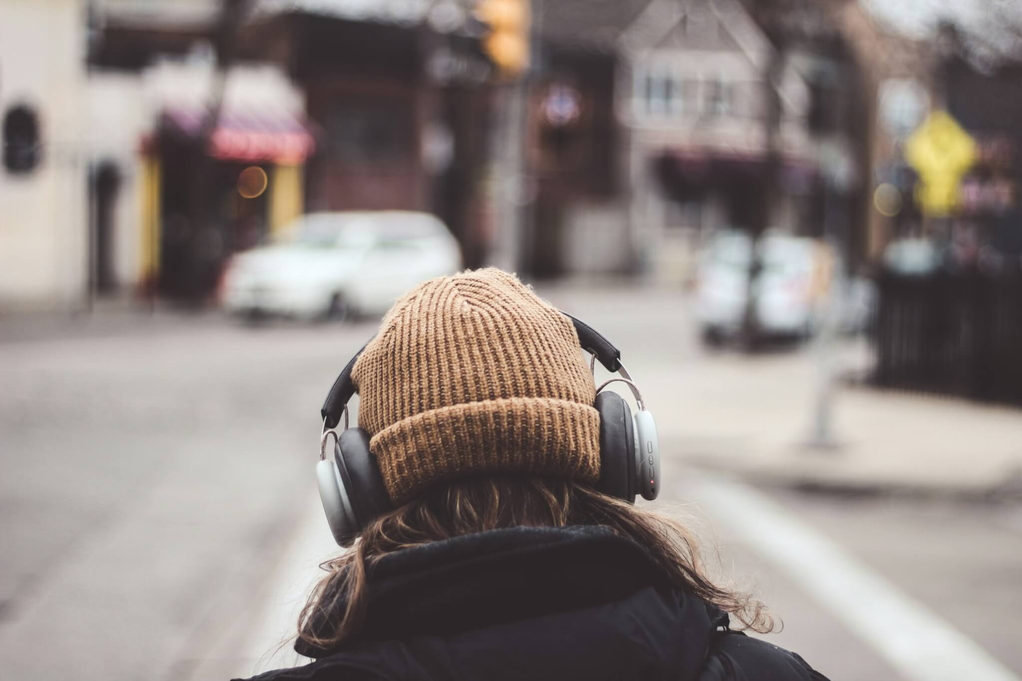 person walking with headphones