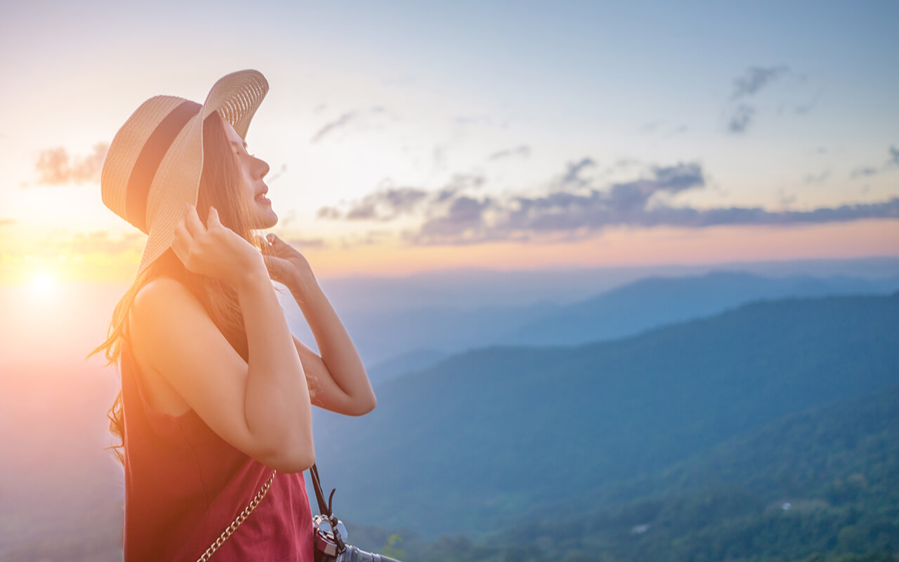 Woman wearing a hat outdoors