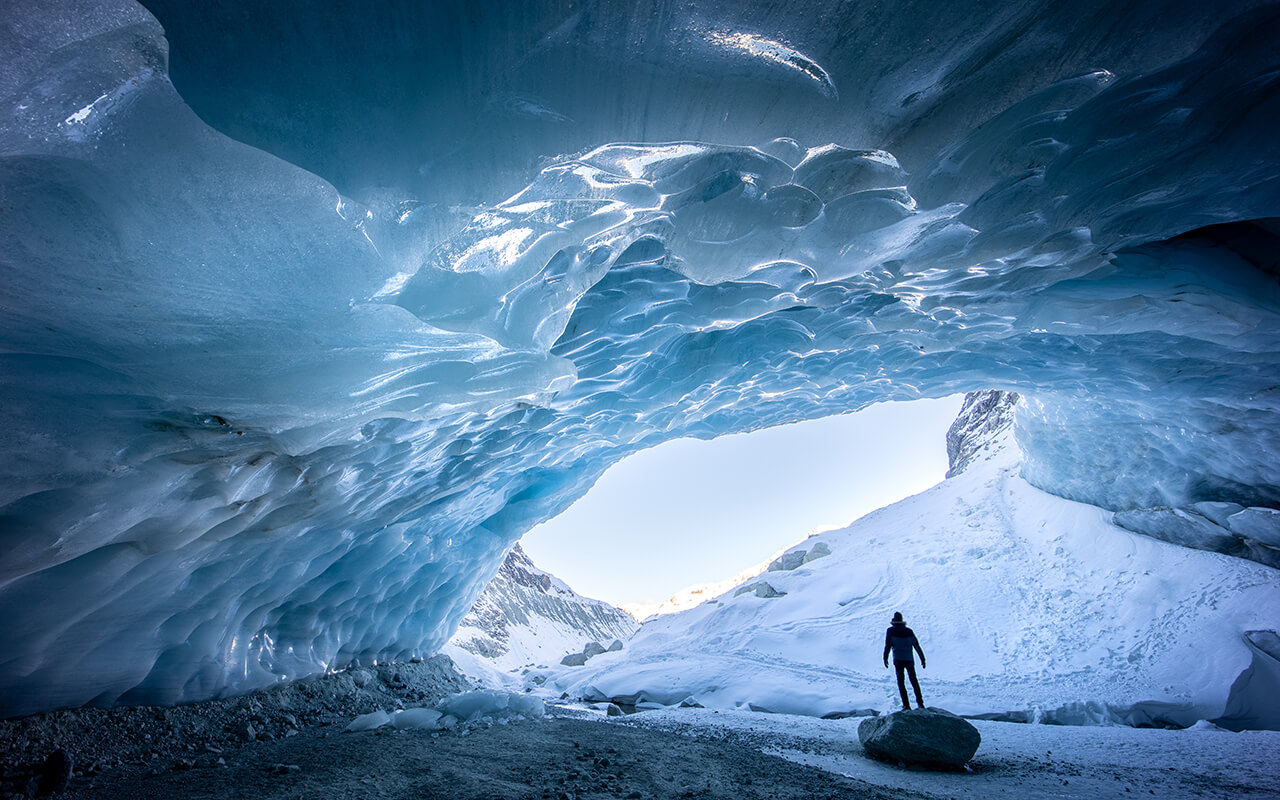 Ice cave exploration in Zinal glacier, Valais Switzerland