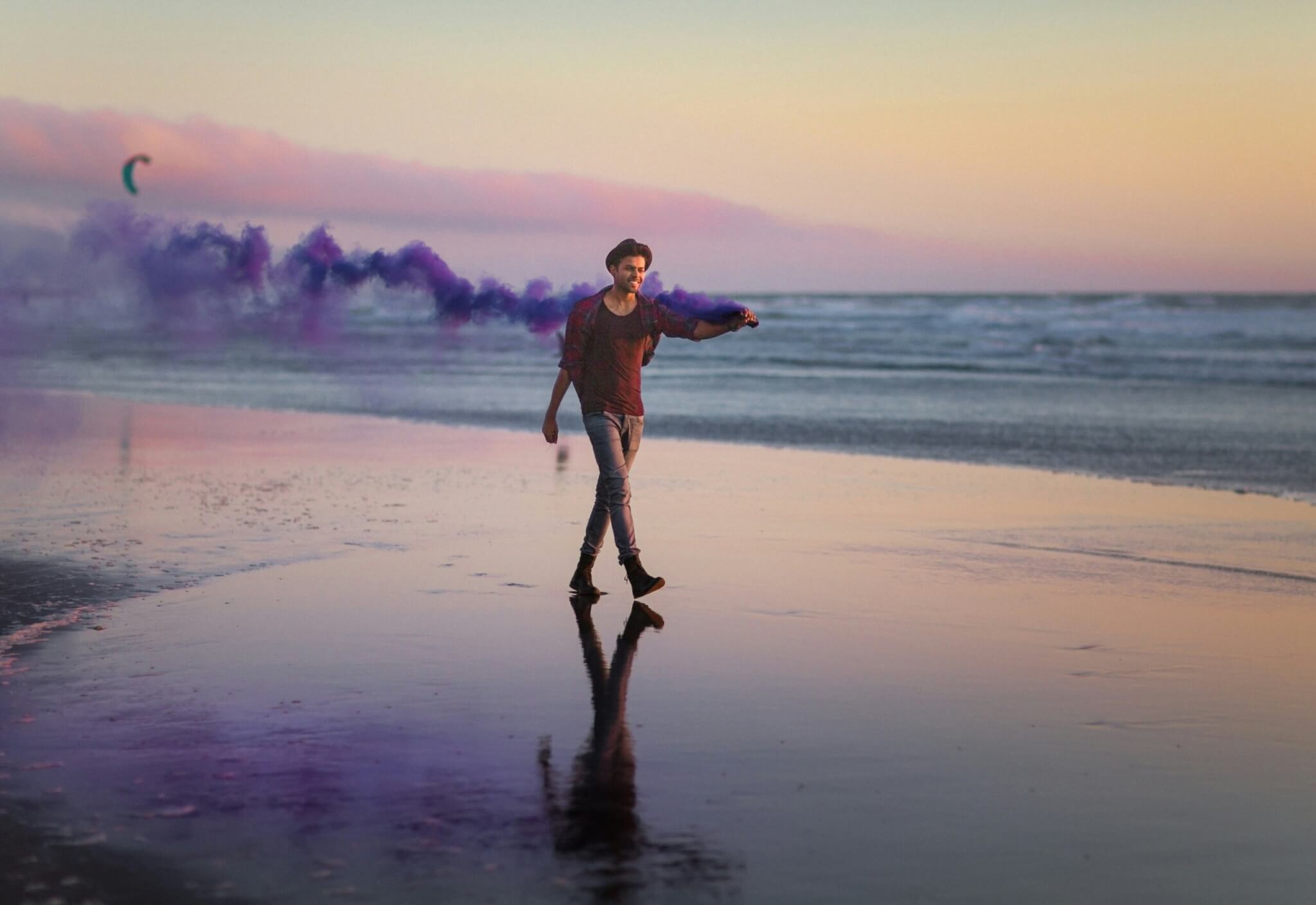 man walking on the beach