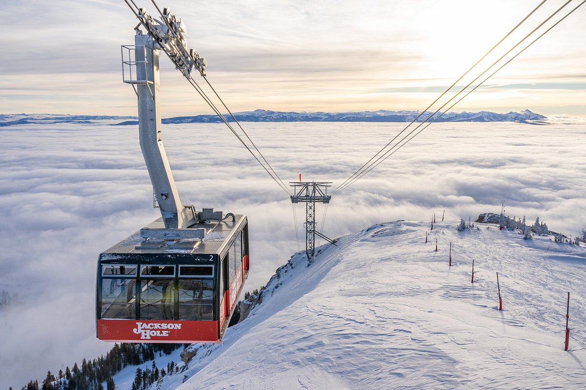 Ariel Tram flying above clouds in winter at Jackson Hole Mountain Resort
