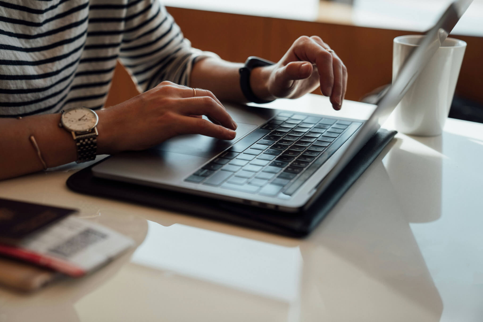 Person typing on a laptop