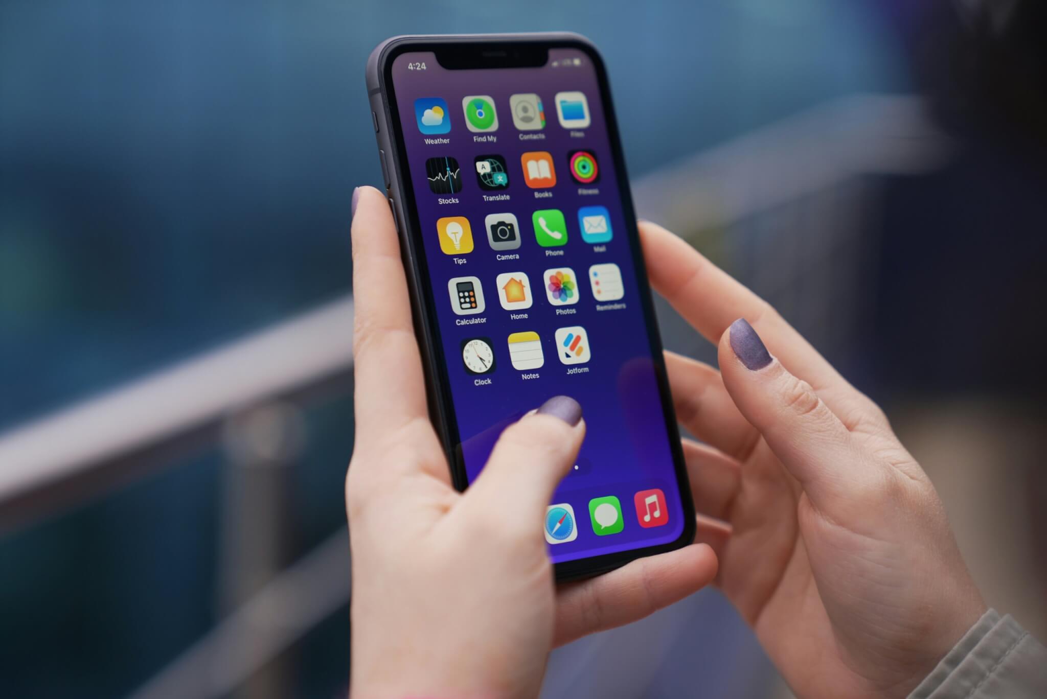 Woman typing on a smartphone