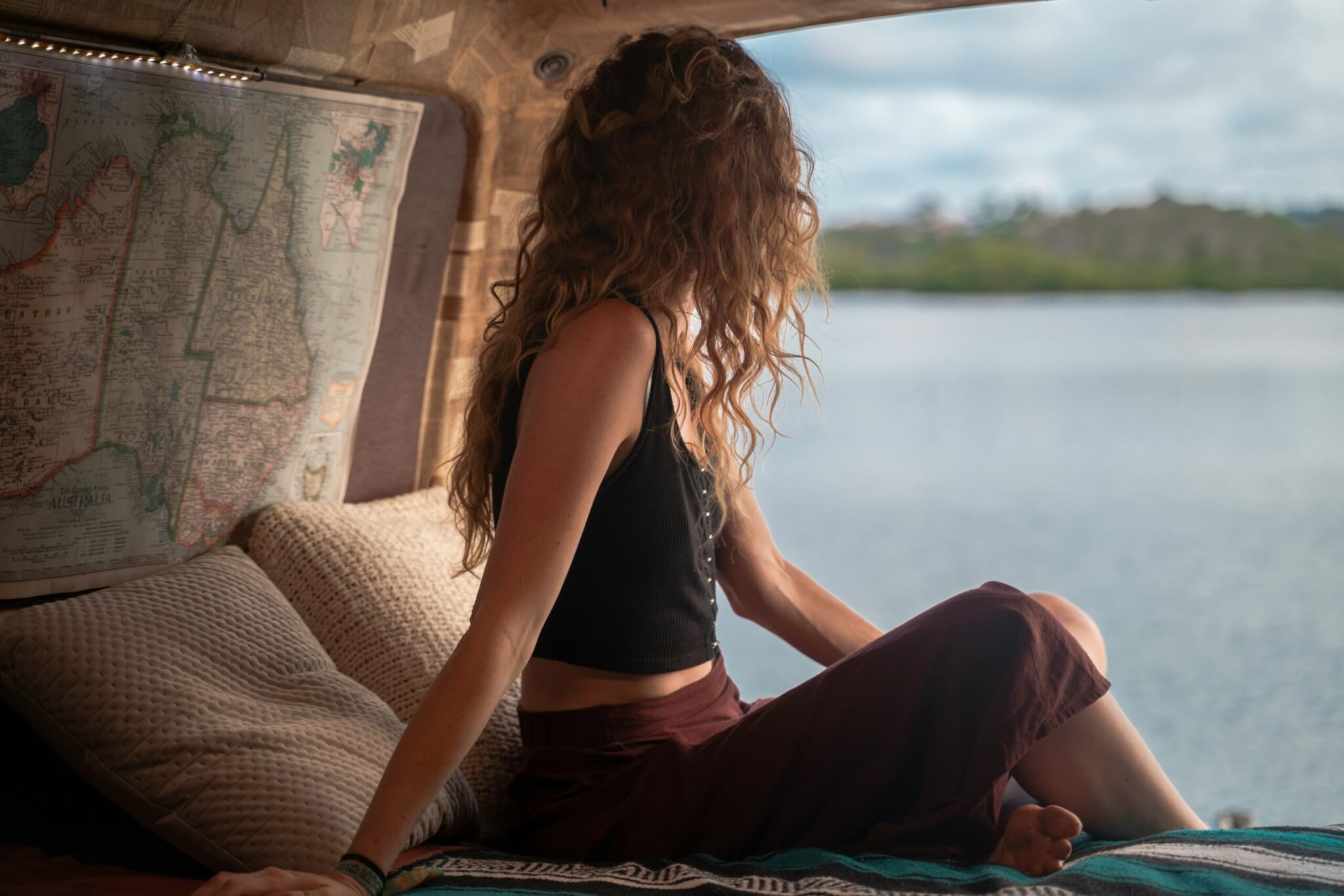 woman traveling alone in a camper van