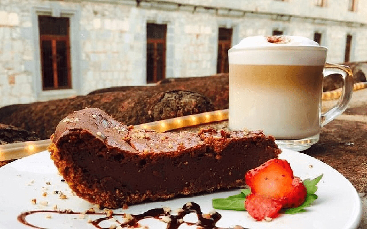 Chocolate cake with coffee beverage