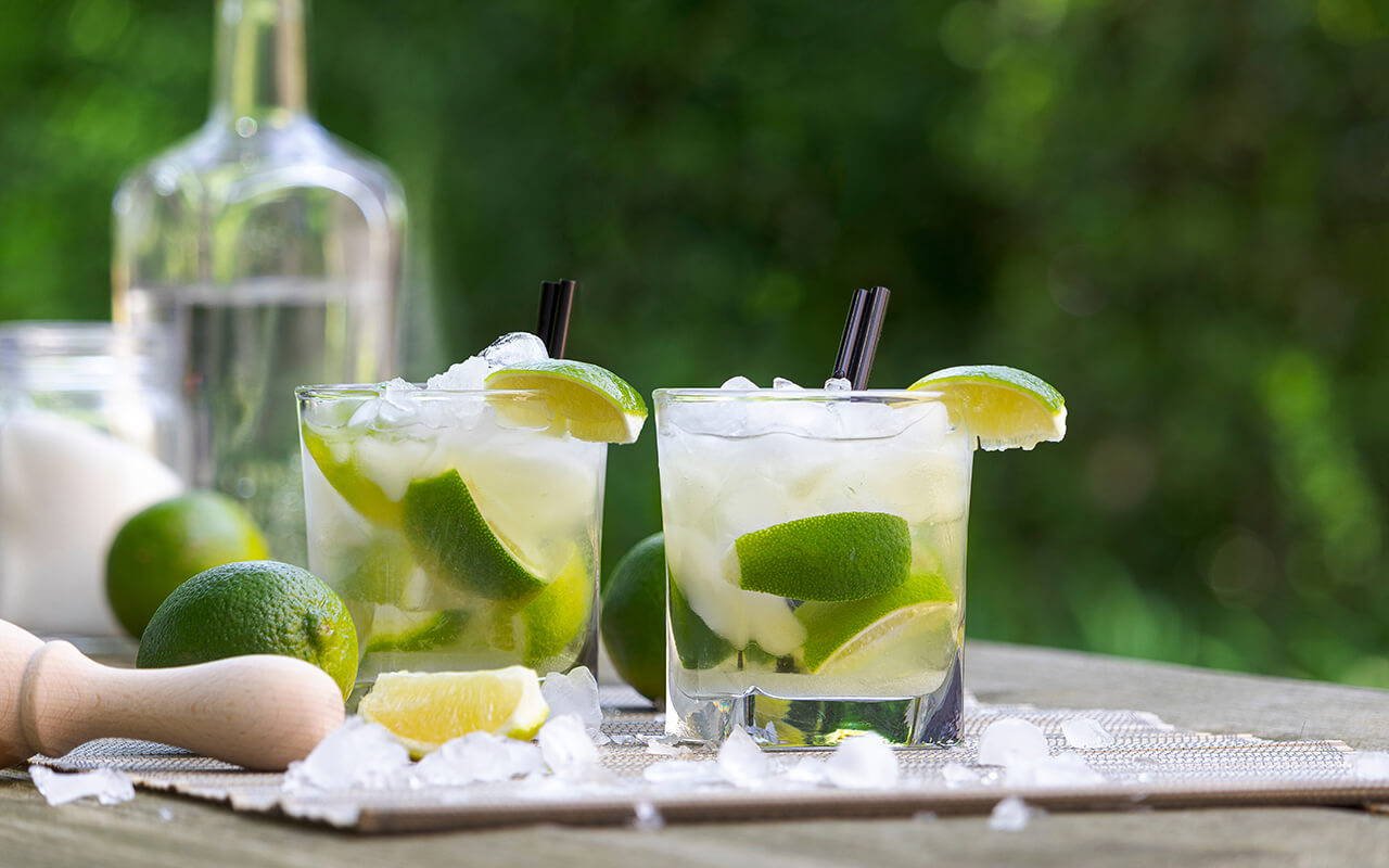 Fresh Caipirinha, Brazilian cocktail with cane sugar and lime