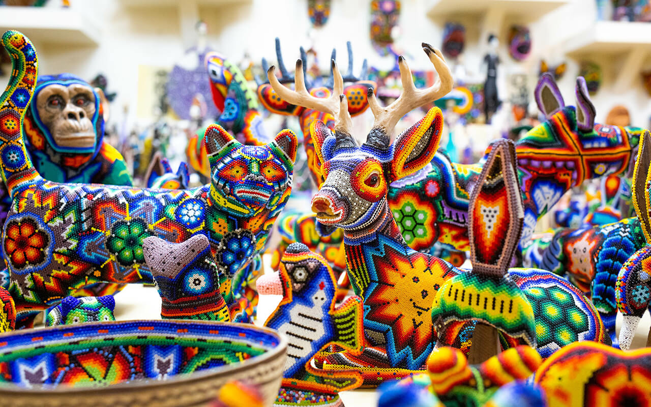 Traditional huichol bead ornament figures mexican culture