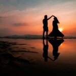 couple dancing in the sunset